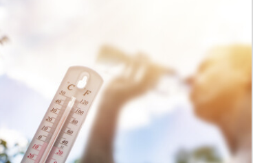 Man drinking water in extreme heat, Thermometer in summer day shows or indicate high temperature