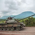 A Congolese army tank heads towards the front line against M23