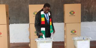 Zimbabwe’s President Emmerson Mnangagwa casts his ballot.