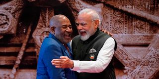 Narendra Modi gestures with African Union Chairman and Comoros President Azali Assoumani